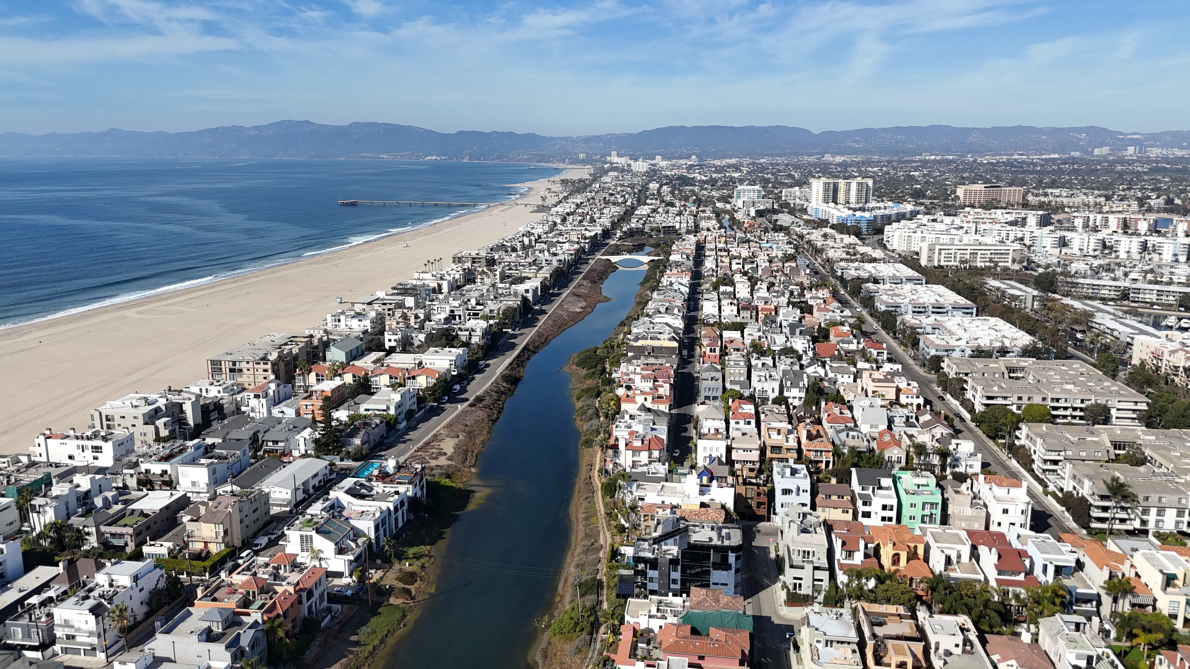 Aerial view of Venice canals meeting the Southern California coastline