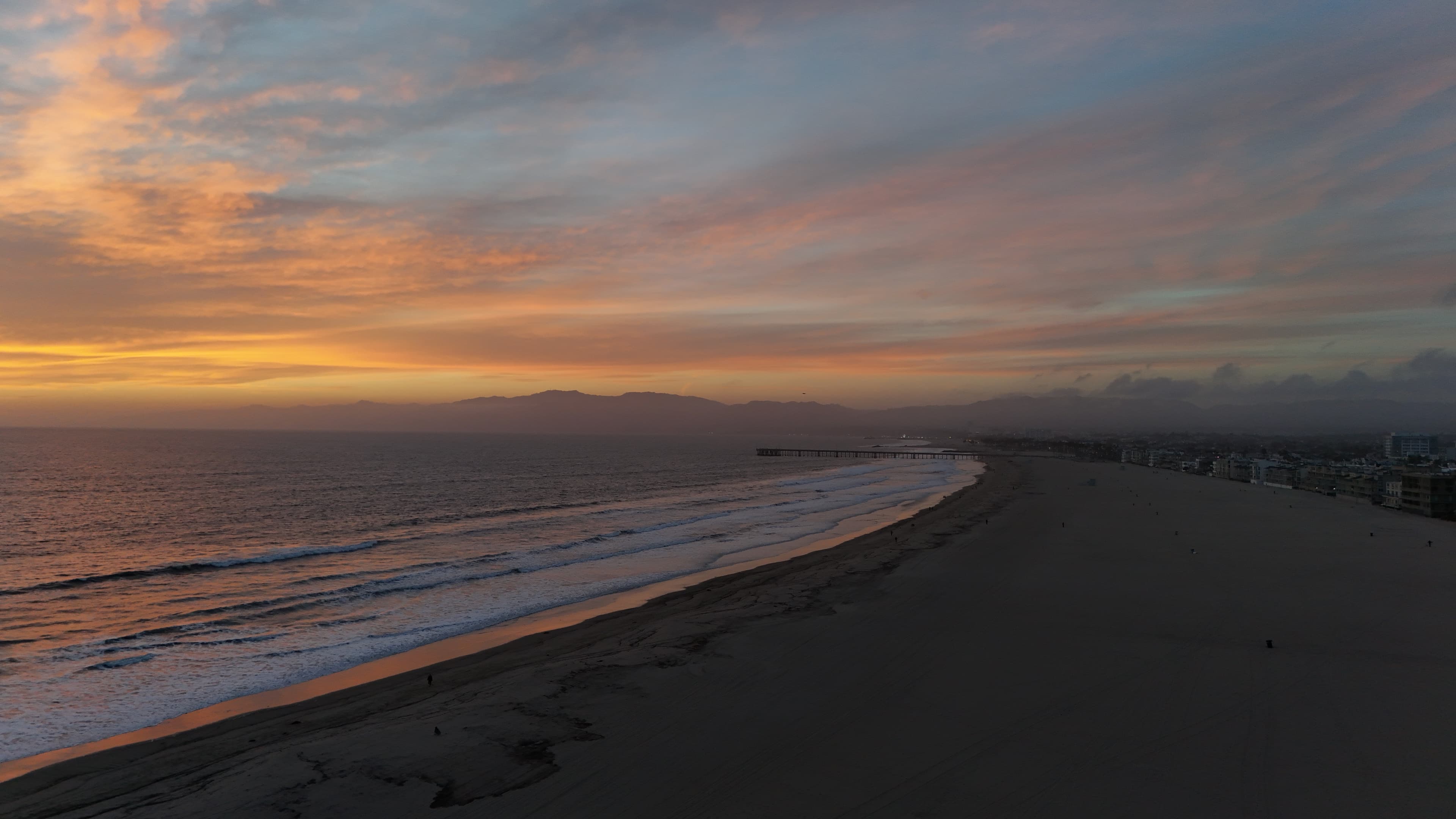 Aerial view of Venice Beach coastline at sunset